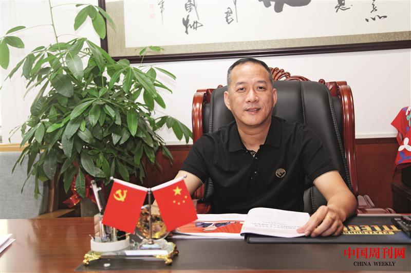 深圳市玉塘紅星股份合作公司董事長周國雄.JPG